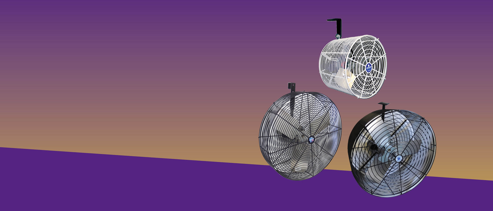 Three Schaefer industrial circulation fans displayed on a purple and tan gradient background.